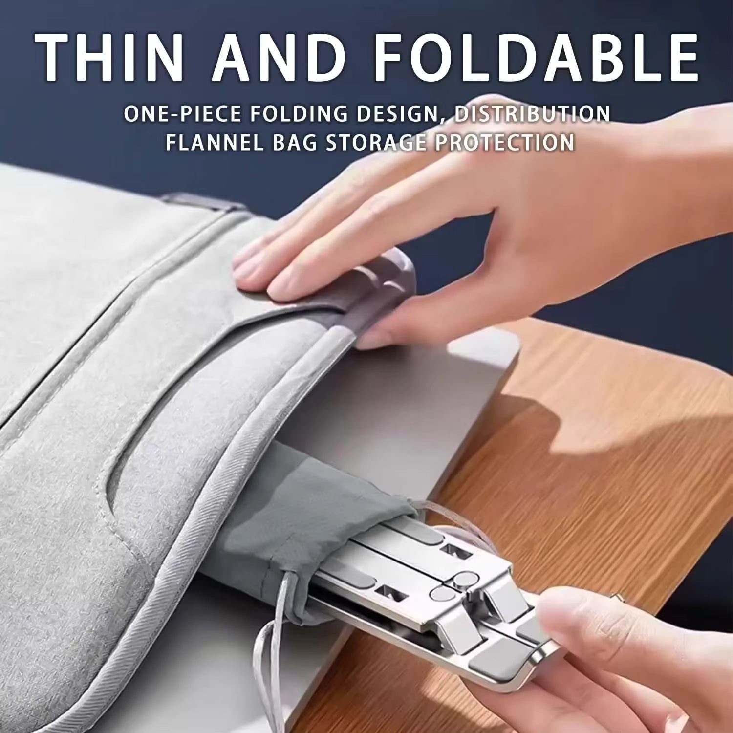 Thin and foldable laptop stand being placed into a bag